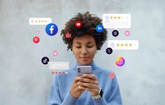 "Women using Smartphone with floating social media icons around her."